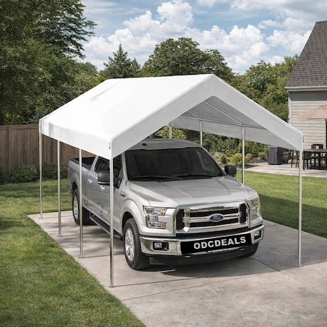 White carport with a silver Ford truck underneath on a sunny day.