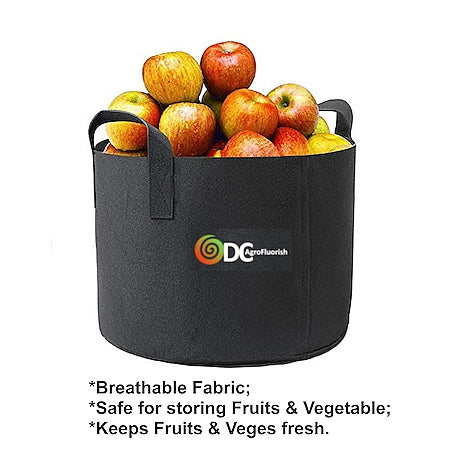 Black fabric fruit and vegetable storage bag filled with apples on a white background, featuring the ODC brand logo.