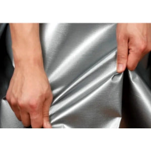 A close-up view Silver Tarp held by two hands